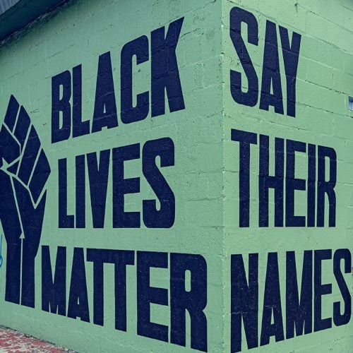 Protestors in Washington, D.C. decry the police killing of Michael Brown.