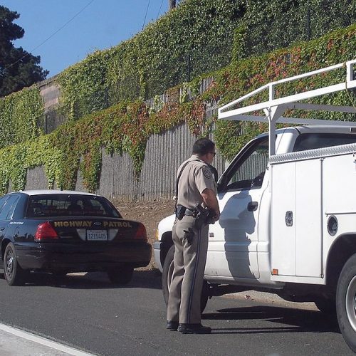 An officer of the California Highway Patrol making a traffic stop on southbound State Route 85 in Cupertino.